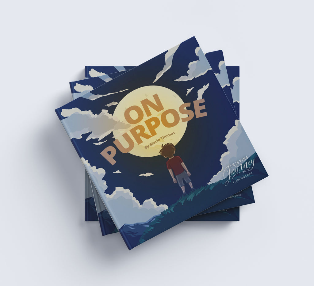 Stack of books titled 'On Purpose' on a light gray background